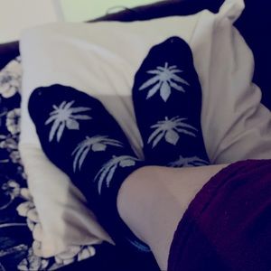 Worn socks. Leaf print.